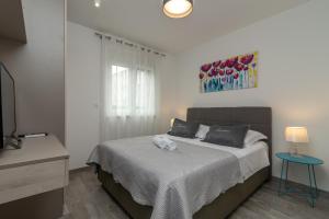Postel nebo postele na pokoji v ubytování Apartment Ferias