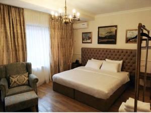 Letto o letti in una camera di Omart Hotel - Gallery