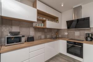 Kuchyň nebo kuchyňský kout v ubytování Apartment Ferias