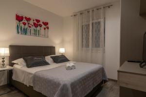 Postel nebo postele na pokoji v ubytování Apartment Ferias