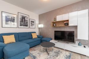 TV a/nebo společenská místnost v ubytování Apartment Ferias