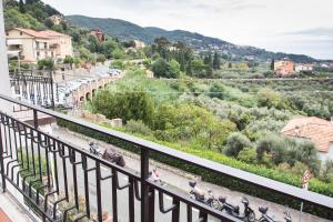 a view from a balcony with bikes parked on the tracks at B&b Golfo dei Poeti in Lerici