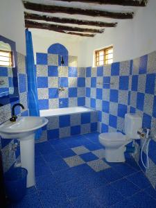 Phòng tắm tại Queen of Sheba Beach Lodge