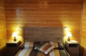 A bed or beds in a room at El Mirador De La Moraña