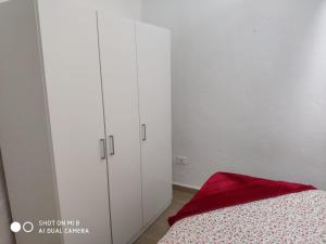Ein Bett oder Betten in einem Zimmer der Unterkunft LA CASITA CALLE EL TANQUE
