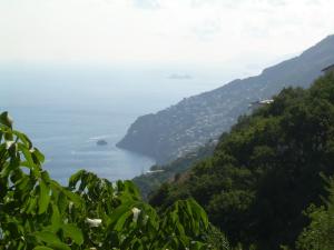 a view of the ocean from a mountain at GIARDINO SUL MARE in Amalfi