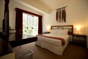 Postel nebo postele na pokoji v ubytování Tierra Viva Machu Picchu Hotel