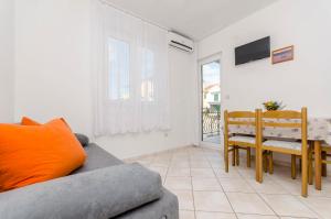 TV a/nebo společenská místnost v ubytování Apartments Mate