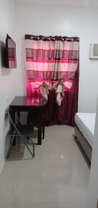 Letto o letti in una camera di Lei Kendee