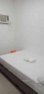 Letto o letti in una camera di Lei Kendee