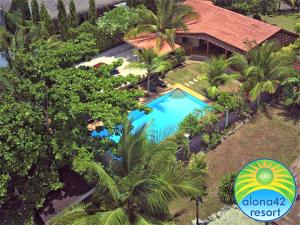 an overhead view of a swimming pool at a resort at Alona42 Resort in Panglao Island