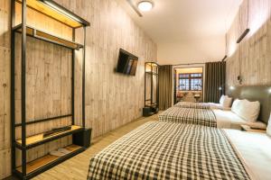 Postel nebo postele na pokoji v ubytování Hotel PaPa Whale