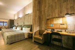 Postel nebo postele na pokoji v ubytování Hotel PaPa Whale