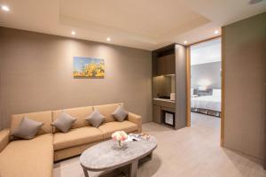 Posezení v ubytování Jin Shi Hu Hotel + 37 fotografií