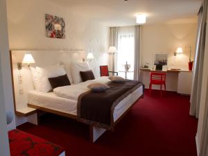 Postel nebo postele na pokoji v ubytování EA Hotel Tereziánský dvůr + 37 fotografií