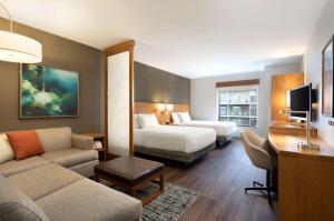 Postel nebo postele na pokoji v ubytování Hyatt Place Austin Downtown