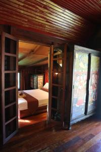 Ein Bett oder Betten in einem Zimmer der Unterkunft Leeloo Paradise