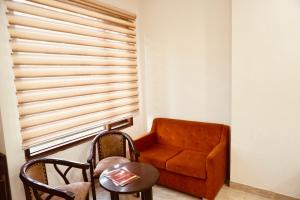 Posezení v ubytování Amora Rooms Dwarka
