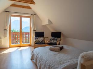 Postel nebo postele na pokoji v ubytování Alpeambient house Dovje