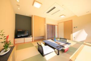 TV a/nebo společenská místnost v ubytování Hotel Shikisai