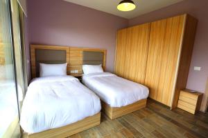 Postel nebo postele na pokoji v ubytování Mist Hotel & Spa