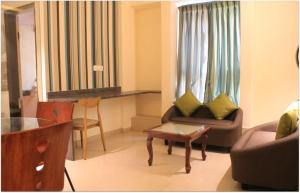 Posezení v ubytování Magnus Calypso Suites Viman Nagar