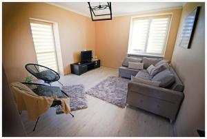 Posezení v ubytování Color 24 Apartament II