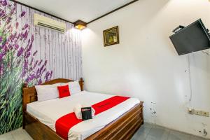 RedDoorz Plus near Taman Sari 2客房内的一张或多张床位