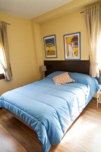Кровать или кровати в номере Apartamentos "Casa Rural de Aldea"