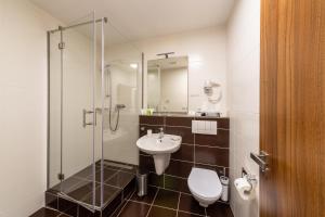 Kúpeľňa v ubytovaní Bohemia Inn Hotel