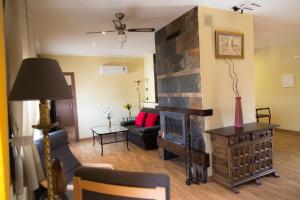 Гостиная зона в Apartamentos "Casa Rural de Aldea"