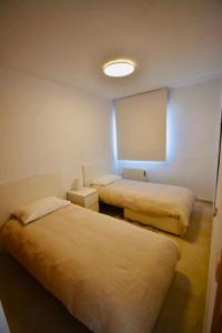 Posteľ alebo postele v izbe v ubytovaní Apartamento En Baeza