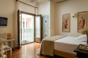 Cama o camas de una habitación en YIT La Casona del Arco