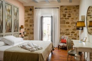 Cama o camas de una habitación en YIT La Casona del Arco