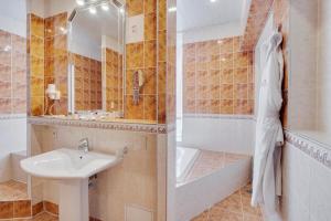 
Ванная комната в Отель Максима Ирбис
