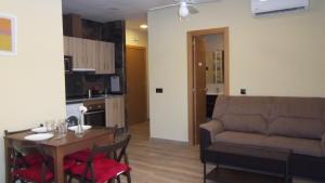 Кухня или мини-кухня в Apartamentos "Casa Rural de Aldea"

