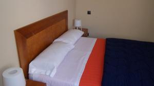 Кровать или кровати в номере Apartamentos "Casa Rural de Aldea"