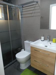 A bathroom at SUITE PLAYA Y MAR - sea view, wifi and AC