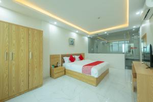 Giường trong phòng chung tại Capital O 417 Truong Son hotel