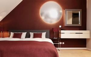 Postel nebo postele na pokoji v ubytování Patentkrug Design Hotel