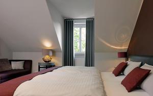 Postel nebo postele na pokoji v ubytování Patentkrug Design Hotel