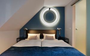 Postel nebo postele na pokoji v ubytování Patentkrug Design Hotel