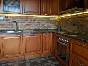 Kuchyň nebo kuchyňský kout v ubytování Luxusní Apartmán v srdci Šumavy
