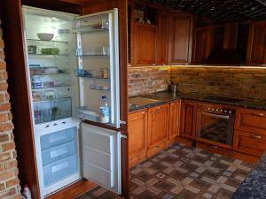 Kuchyň nebo kuchyňský kout v ubytování Luxusní Apartmán v srdci Šumavy