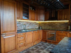 Kuchyň nebo kuchyňský kout v ubytování Luxusní Apartmán v srdci Šumavy