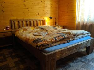 Postel nebo postele na pokoji v ubytování Luxusní Apartmán v srdci Šumavy