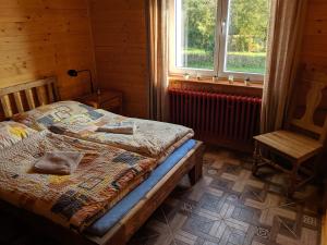 Postel nebo postele na pokoji v ubytování Luxusní Apartmán v srdci Šumavy