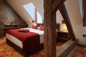 Posteľ alebo postele v izbe v ubytovaní Hotel Singer