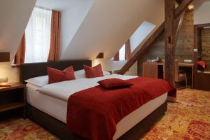 Posteľ alebo postele v izbe v ubytovaní Hotel Singer