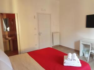Postel nebo postele na pokoji v ubytování B&B Pompeii Rooms